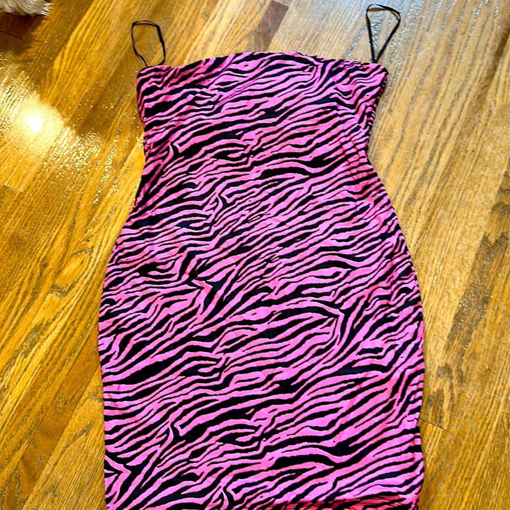 Brand new strapless body con